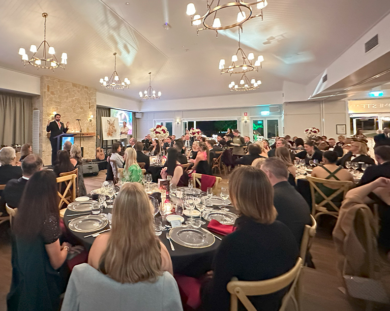 Guests Seated inside Homestead at Wildlife Gala