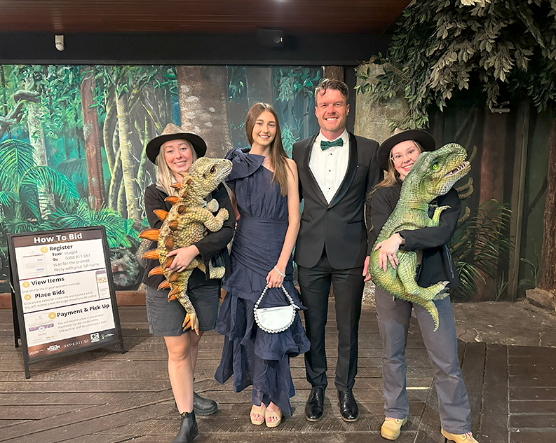 Guests at the Gala Meet baby dinosaur puppets