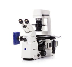 High-tech laboratory microscope with multiple lenses.